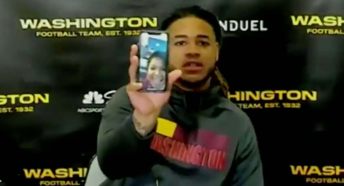 Chase Young’s mom via FaceTime takes question during son’s postgame(01)