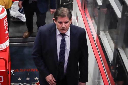 Peter Laviolette walks down the tunnel postgame at Capital One Arena.