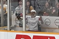 Alex Ovechkin, palms raised upward in penalty box